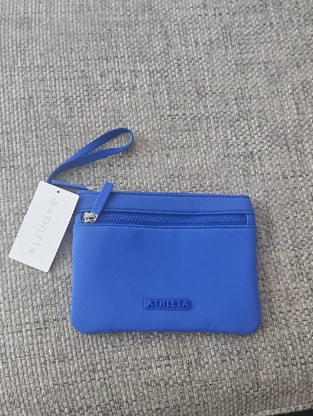 Athleta cobalt blue wristlet clutch